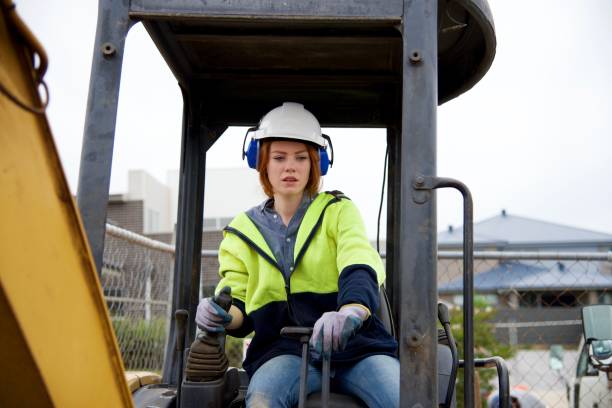 istock SYD112017 Female construction worker driving bulldozer 887597788