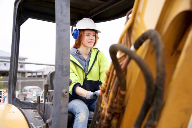 istock SYD112017 Female construction worker driving bulldozer 887597856