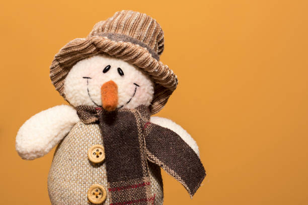 istock rag christmas doll on warm background 887599742