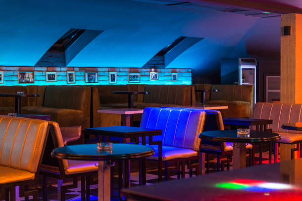 istock Tables and seatsin restaurant interior 887606050