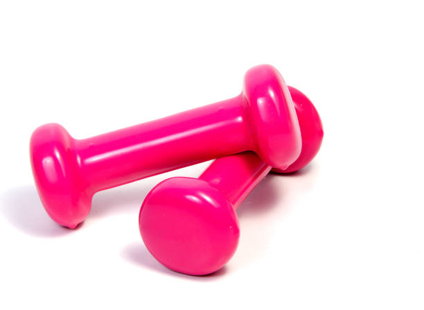 istock The dumbbells isolated on a white background 887608792