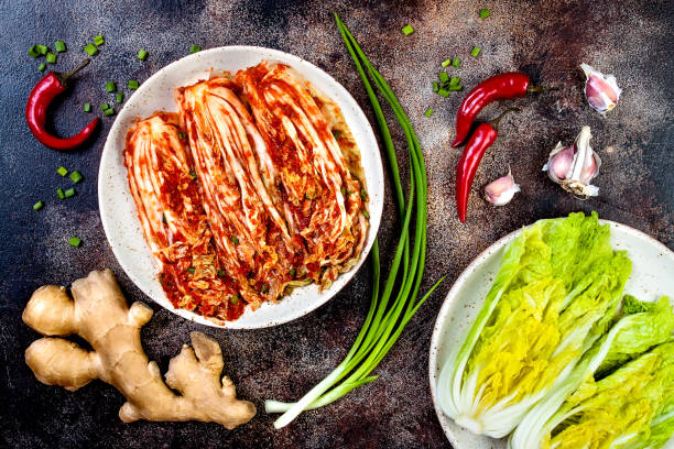 istock Preparing cabbage kimchi. Korean traditional cuisine. Fermented food. 887618200