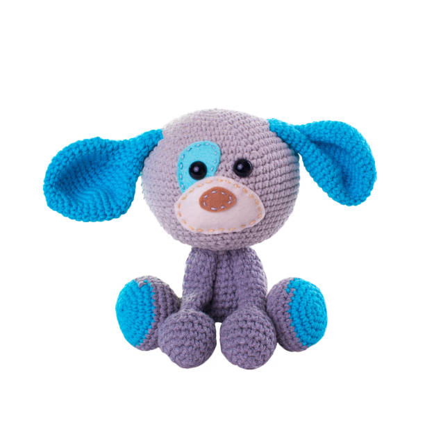 istock toy knitted dog isolated on white 887621466