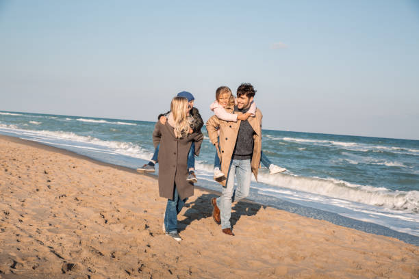 istock happy piggybacking family 887626358