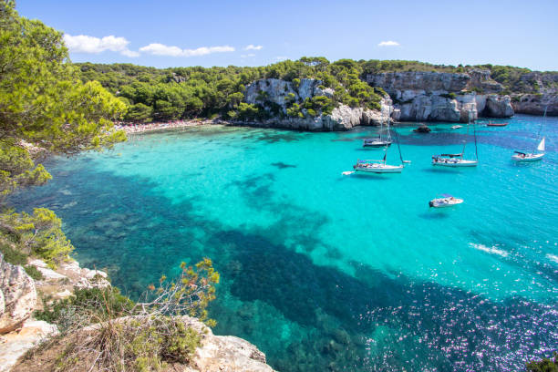 istock Boats and yachts on Macarella beach, Menorca, Spain 887631560