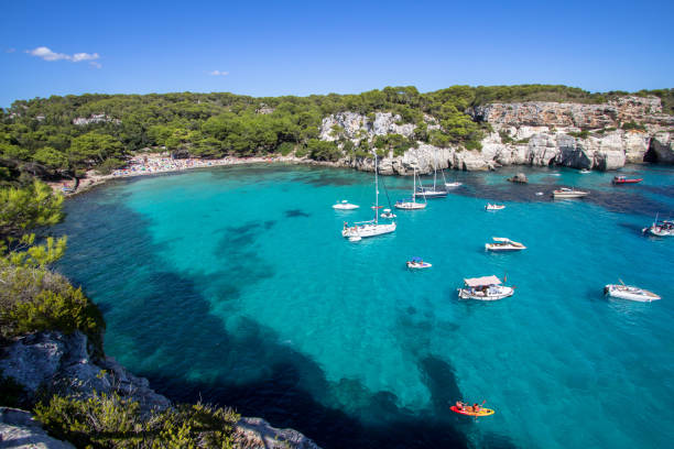 istock Boats and yachts on Macarella beach, Menorca, Spain 887633150