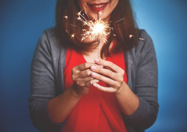 istock Asian Woman with sparkler. 887635922