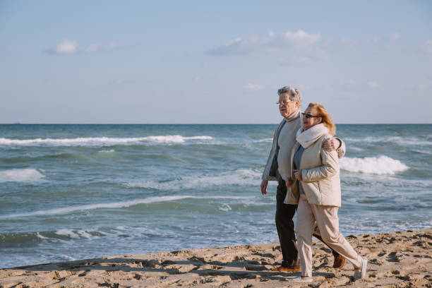 istock senior couple on seashore 887646484