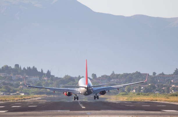 istock Airplane landing on Corfu airport 887647186