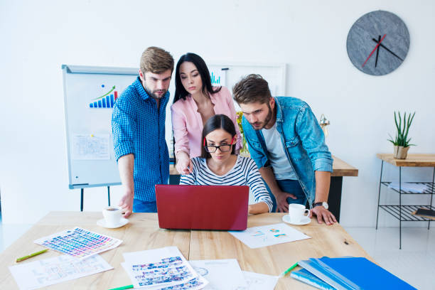 istock Young professional start up team in office. 887651250