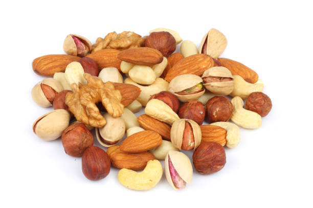 istock mix almonds, cashew nuts, hazelnut, peanuts, walnuts, pistachio isolated on white background 887652100