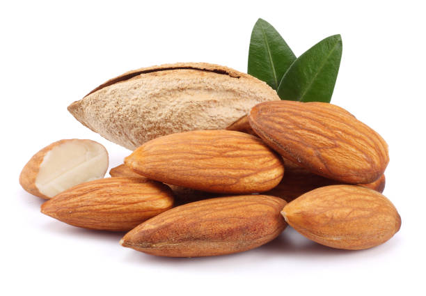 istock almond with green leaf isolated on white background 887654242
