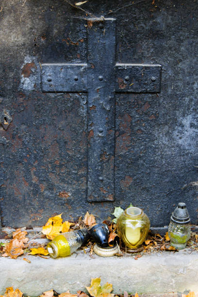 istock Old rusty memorial cross at cemetery. Religious Christian symbol 887654882