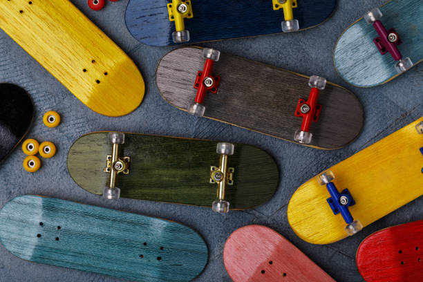 istock Multicolored fingerboards and details, top view 887664134