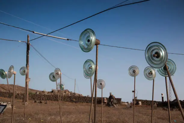 Odd Forest made of glass telephonic insulators. Lanzarote, Spain