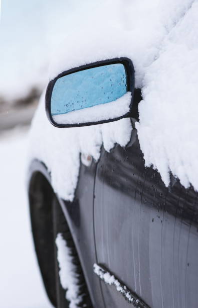 istock Modern car outdoor covered with snow. 887677350