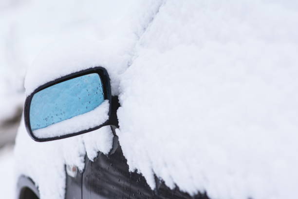 istock Modern car outdoor covered with snow. 887677632