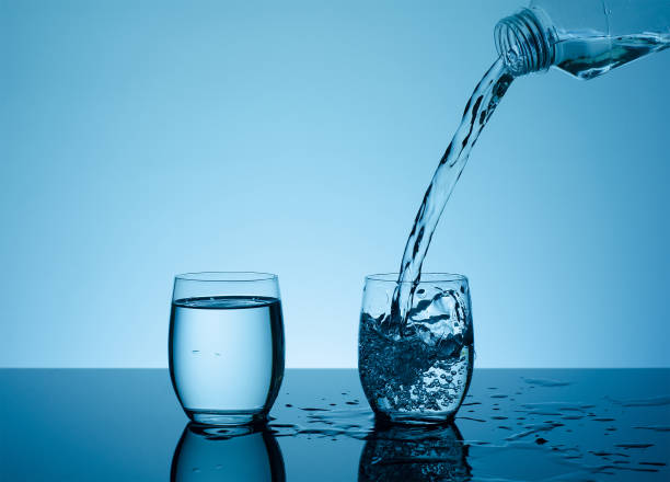 istock Creative splashing water in the glass 887704152
