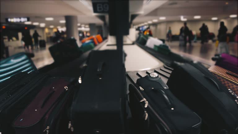 Luggage on baggage claim in the airport.