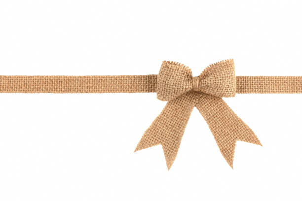 istock Burlap ribbon bow isolated on white background 887709142