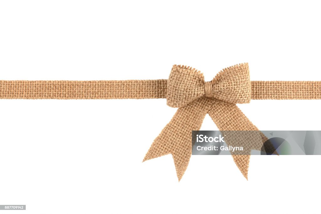 Burlap ribbon bow isolated on white background Burlap ribbon bow isolated on white background. Tied Bow Stock Photo