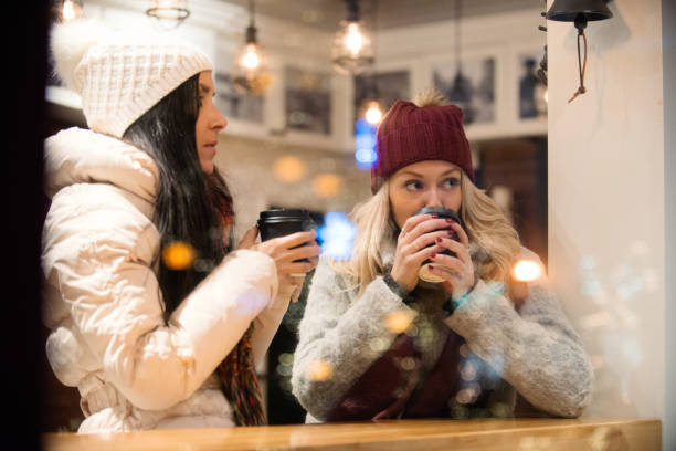 istock Christmas Shopping with two young women 887709848