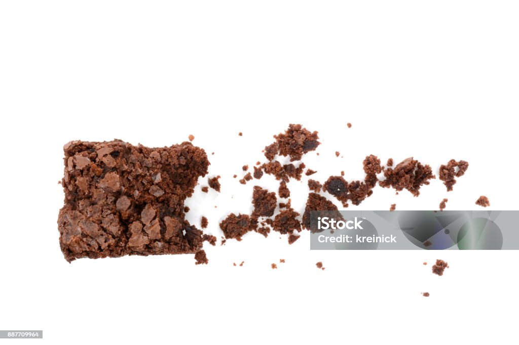 chocolate brownie with crumbs Homemade brownie and crumbs isolated on a white background Brownie Stock Photo