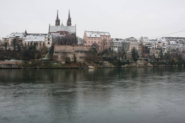 The Carnival of Basel (Basler Fasnacht) is the biggest carnival in Switzerland and takes place every year between February and March in Basel. The image shows a Town Square with many Fasnacht participants and wonderful lanterns in the tight.