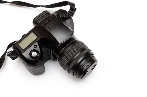 Digital single-lens reflex camera, isolated on white background.