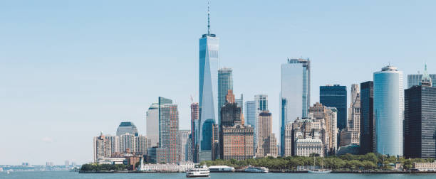 istock Skyscrapers In City Against Clear Sky 887722054
