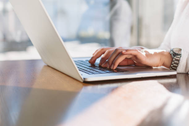istock Woman typing on her laptop 887732142