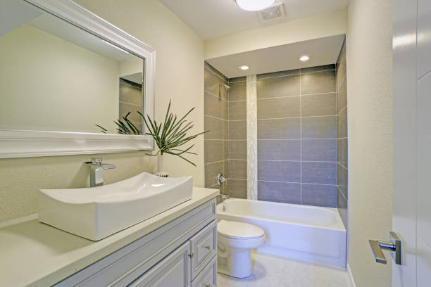 istock Freshly renovated bathroom features shower tub combo 887732832