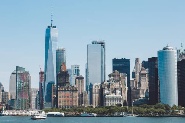 istock Skyscrapers In City Against Clear Sky 887743410