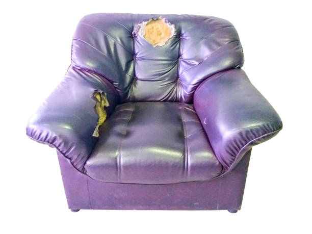 istock Lacks of old black leather chair 887749118