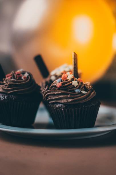 istock Birthday sweet chocolate cupcakes 887749438