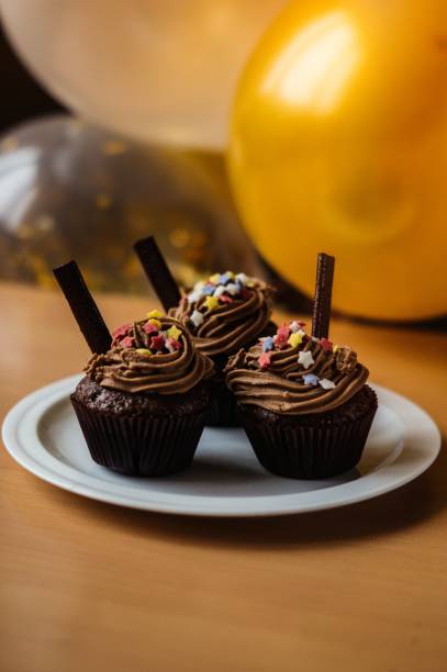 istock Birthday sweet chocolate cupcakes 887749494
