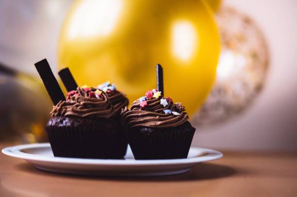 istock Birthday sweet chocolate cupcakes 887749506