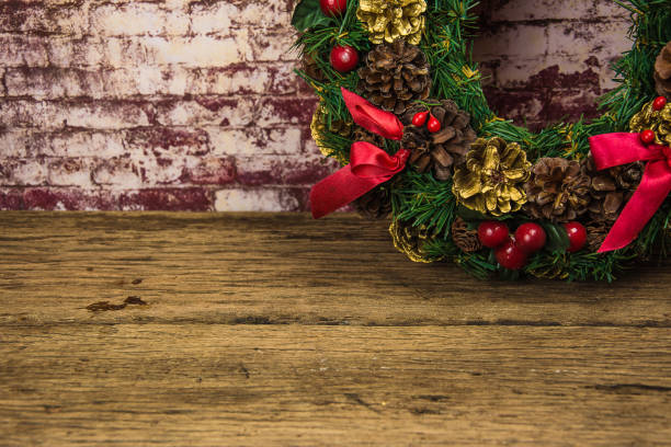 istock christmas wreath on  brick wall background 887755748