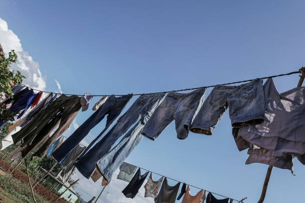 istock Hanged clothes on rope at garden to dry 887792112