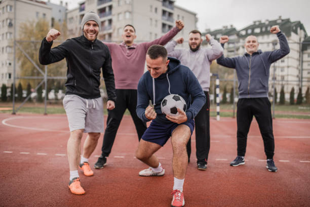 istock Happy soccer team 887806188