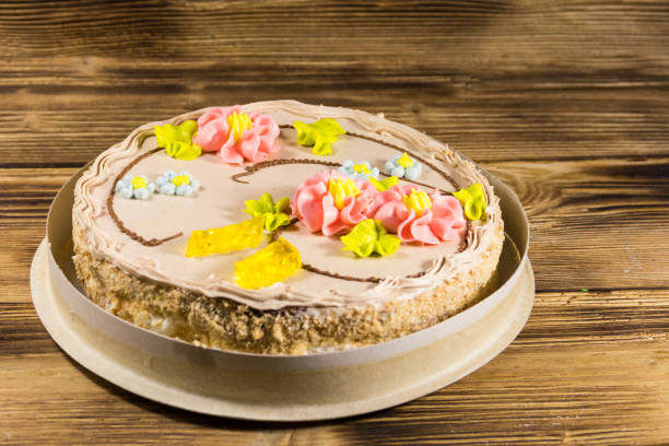 istock Cardboard box with Kiev cake with cream, nuts and meringue 887806962