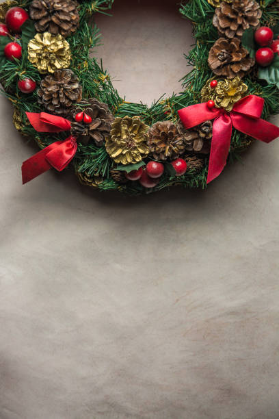 istock christmas wreath on Gray  background . 887812084