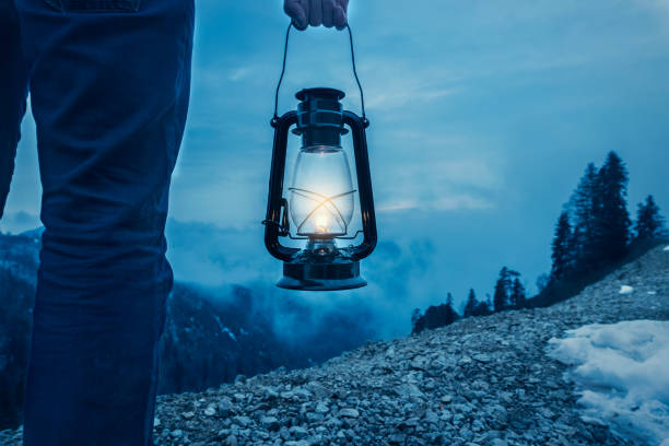 istock Oil Lamp On Peak Of Mountain 887819772