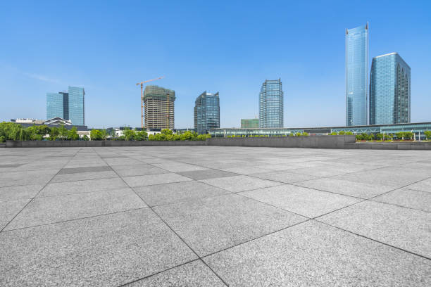 istock Empty brick floor with modern buildings 887841272