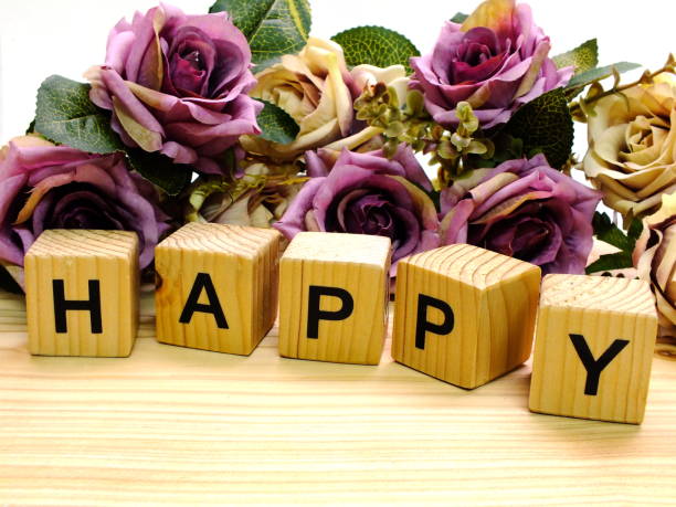 istock lettering happy  with artificial roses flowers bouquet 887895888