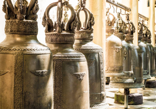 Bells in Thailand Temple hanging in a row during day