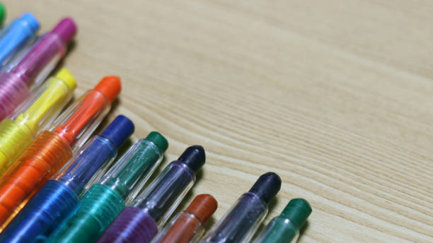 istock Colorful colored pencils on a wood background. 887896198