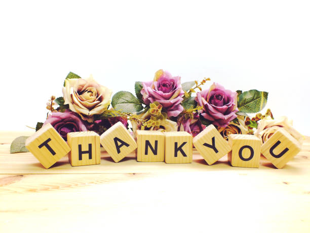 istock lettering thank you with artificial flowers bouquet 887898464