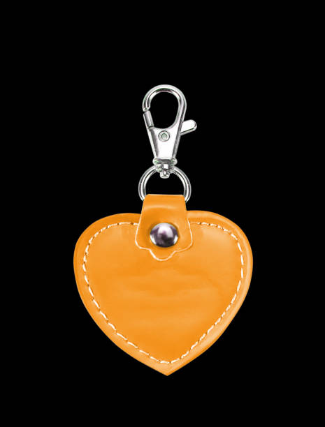 istock Leather Round Keychain with clip lock for Key Isolated on black background 887899166