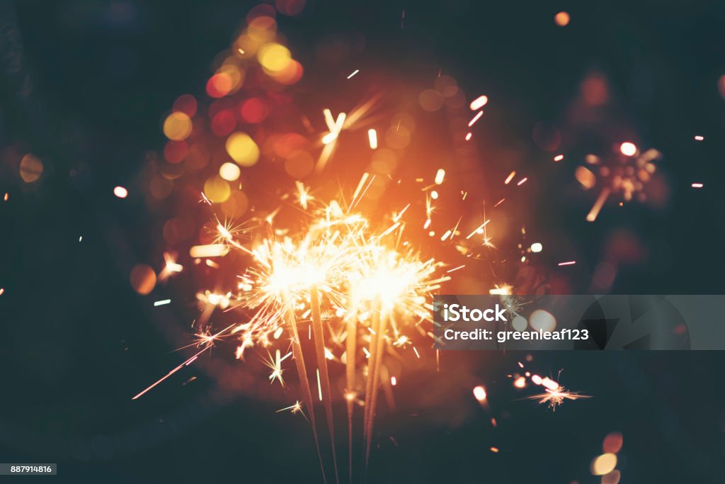 Sparkler with background Christmas light bokeh Abstract Stock Photo